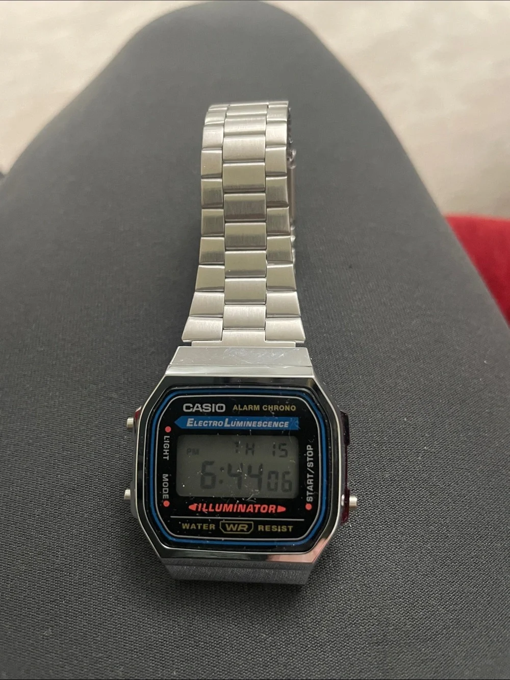 Casio Silver Digital Watch with Black and Blue Accents